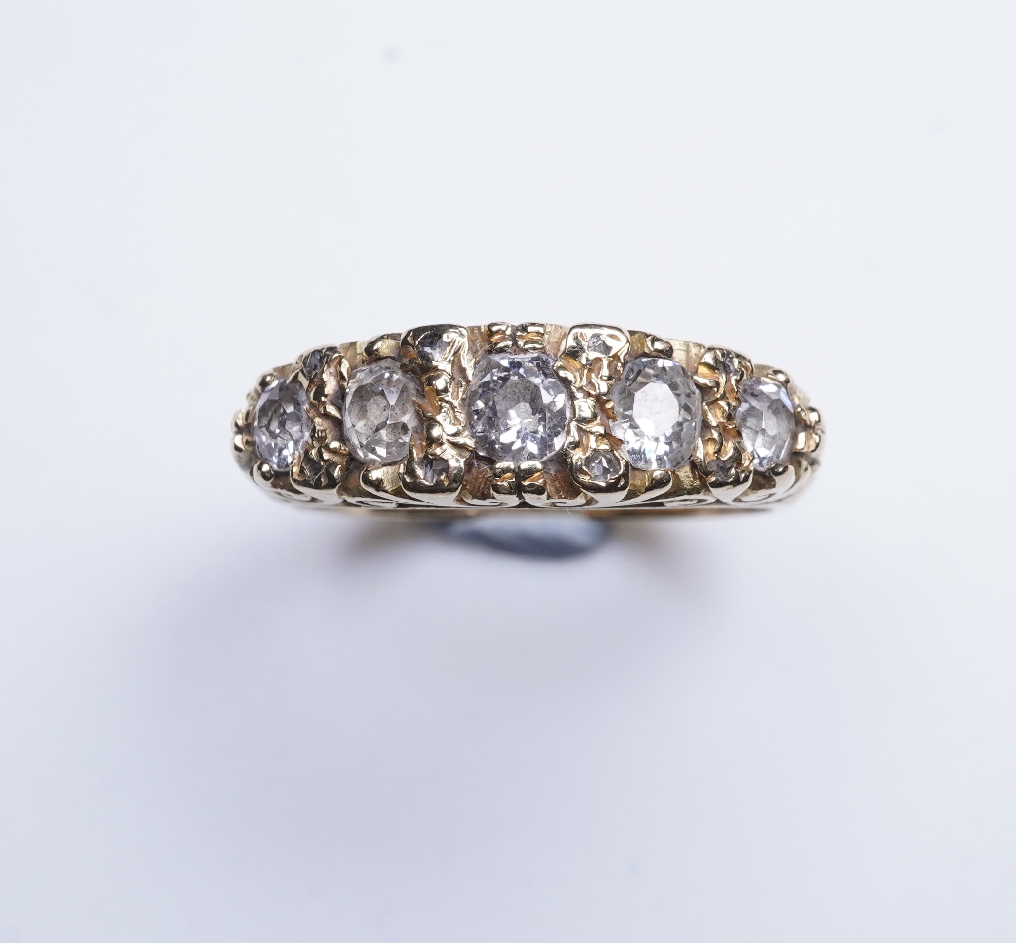 An 18ct gold five-stone diamond ring